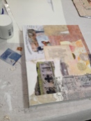 First layer of medium, vintage papers and images, and gesso
